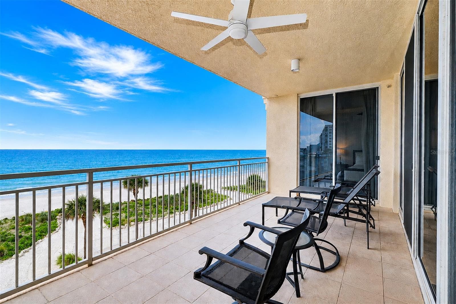 ... Side View of 27' X 10' Balcony .. Sliders on Far End Access the Master Bedroom,. - 15208 GULF BLVD #404, MADEIRA BEACH