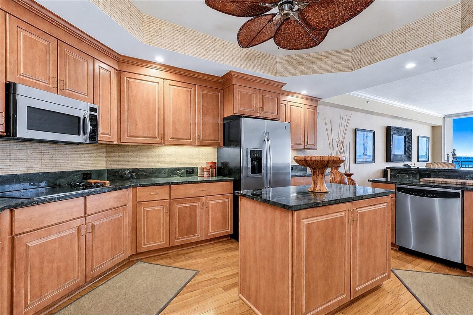 .. Kitchen Pic 2... Solid Wood Cabinetry - Granite - GE Profile Appliance Package - Prep Island - Water View. - 15208 GULF BLVD #404, MADEIRA BEACH