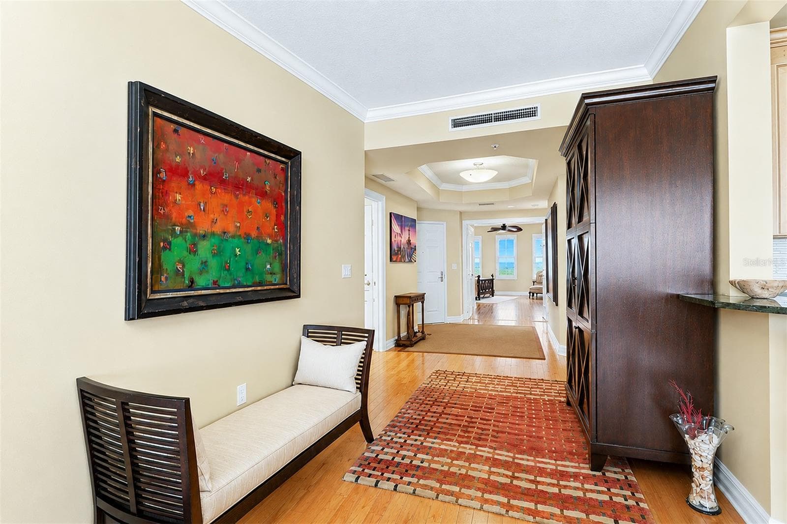 ... Solid Wood Floors Thru Out Condo Convey a Soft Welcoming Aura ...The Larger of The Guest Suites Accessed Thru the Double Open Parlor Doors on East side of Residence 404.. I've seen this Large Guest Suite Double  as a Home Office / Music Room / Parlor etc.. - 15208 GULF BLVD #404, MADEIRA BEACH