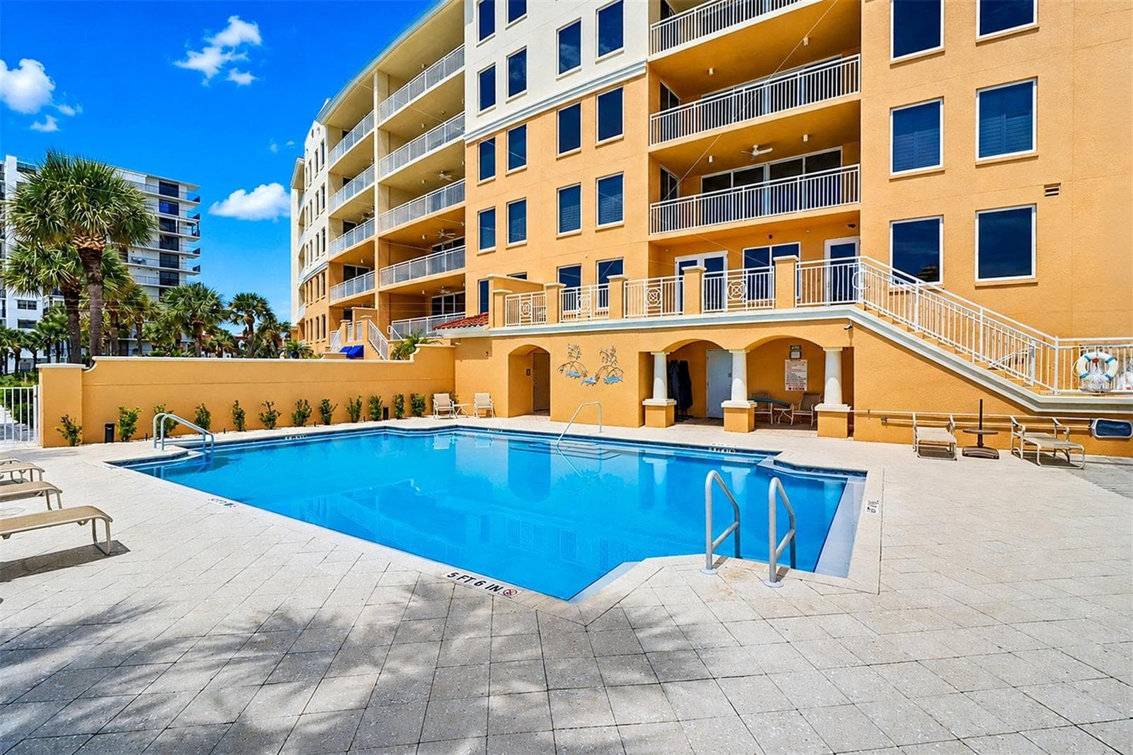 ... The Stairs From the Pool Area to the 2nd Floor Lounging Area  has Clubhouse & Workout Facility Access. The Clubhouse has Wi Fi and there are also Two Restrooms .. - 15208 GULF BLVD #404, MADEIRA BEACH