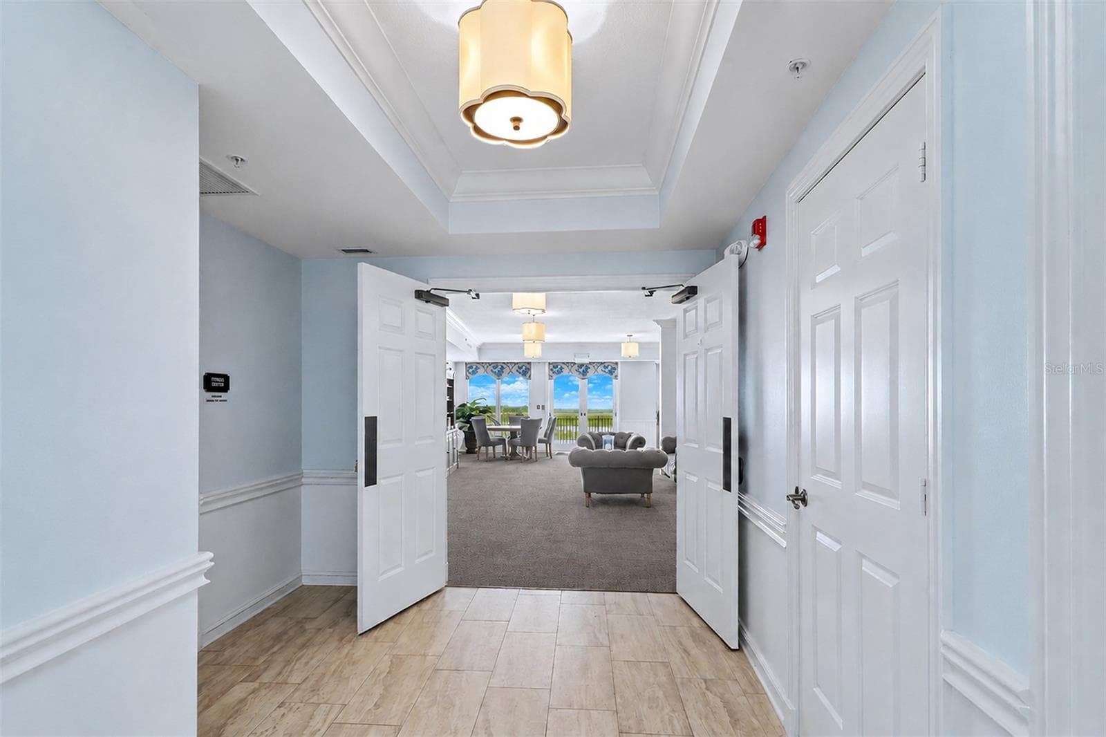 ...Sereno Amenities: Waterfront Clubhouse w Wifi Straight Ahead.. Workout Facility Door on Left... Two Restrooms on Right.. 2nd Floor has Balcony Lounging  or Stairs to Pool Area. - 15208 GULF BLVD #404, MADEIRA BEACH