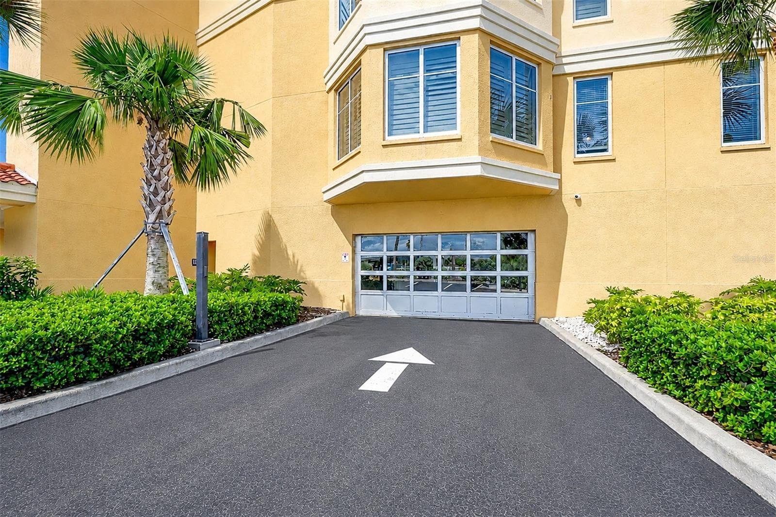 .. Secured Garage Entrance on North Side of Complex. The Garage Exit on South end of Garage. Access to Garage can be Programmed into your Car or Clicker For Your Visor. - 15208 GULF BLVD #404, MADEIRA BEACH