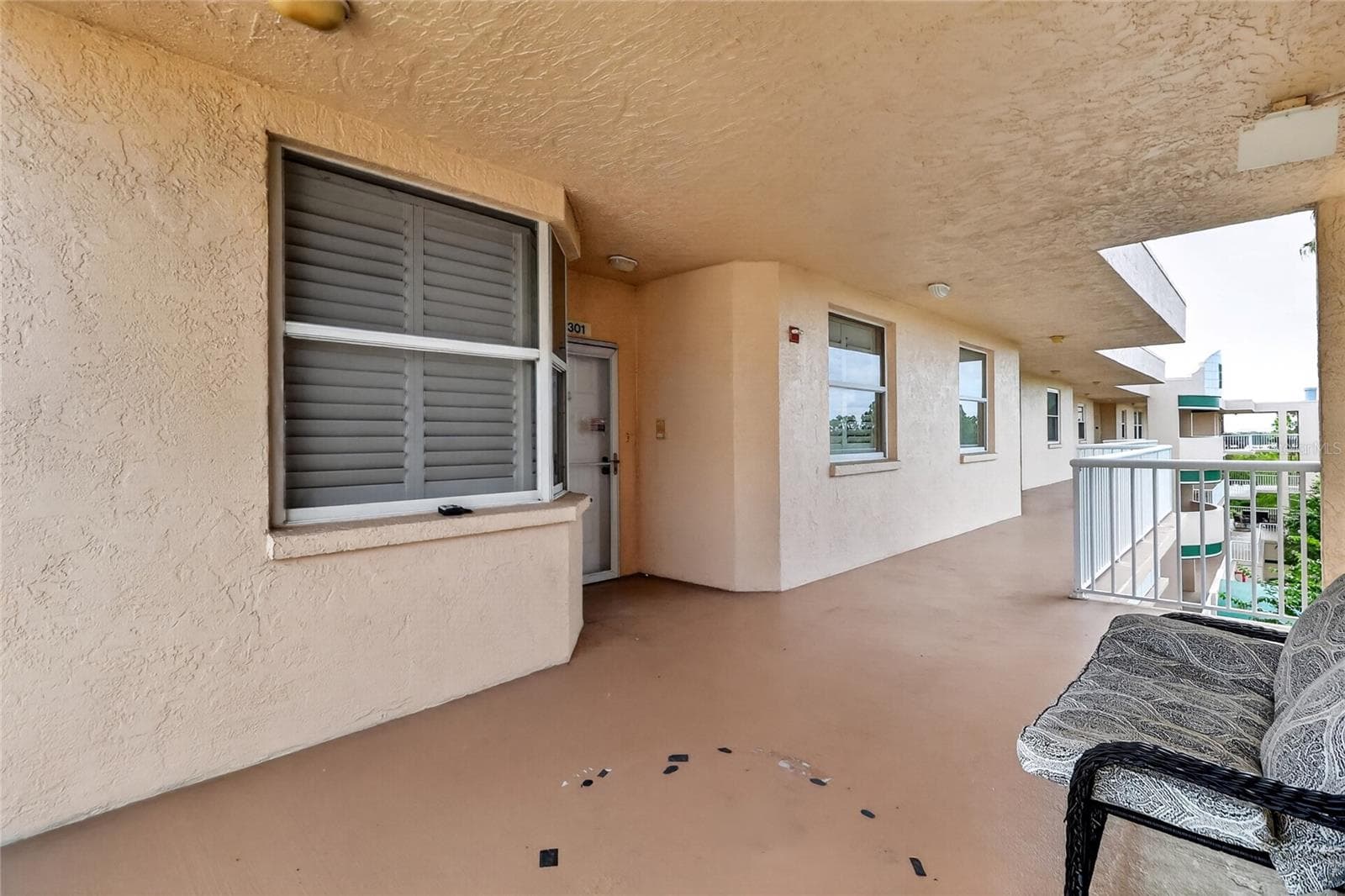 Front door to unit showing patio - 6251 SHORELINE DR #2301, SEMINOLE