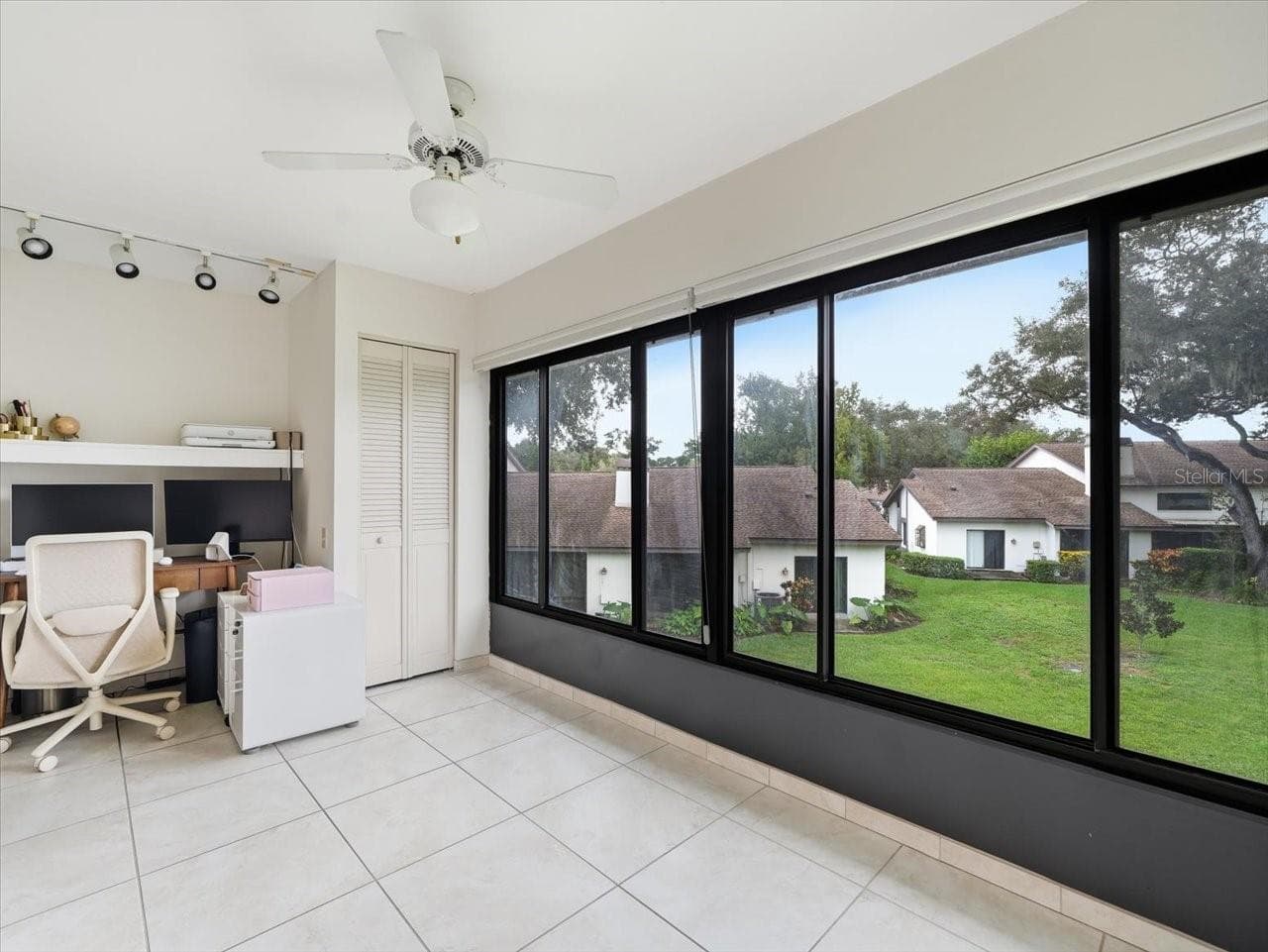 Enclosed Sunroom Desk - 1816 LAKE CYPRESS DR #1816, SAFETY HARBOR