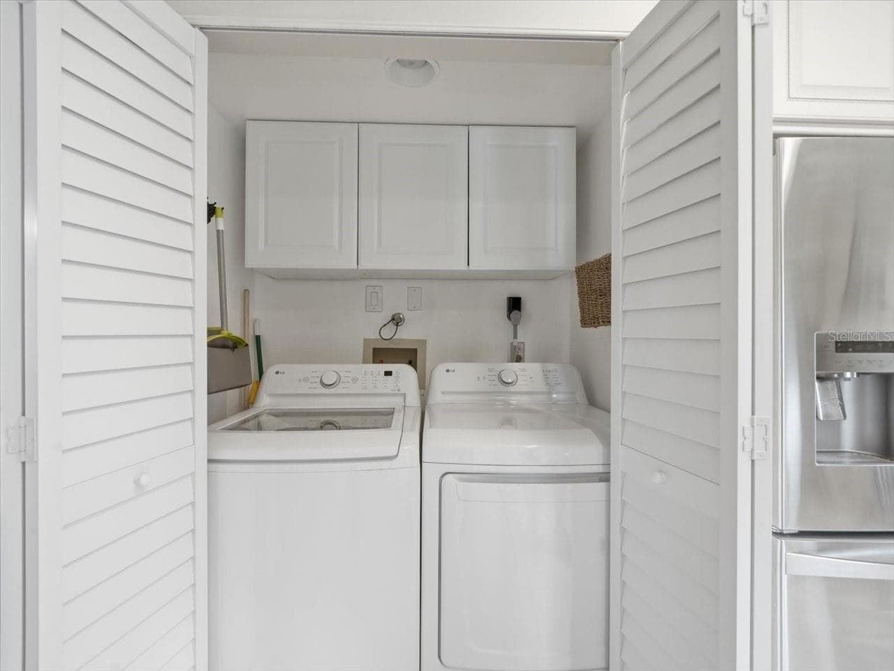 In-Unit Laundry Closet - 1816 LAKE CYPRESS DR #1816, SAFETY HARBOR