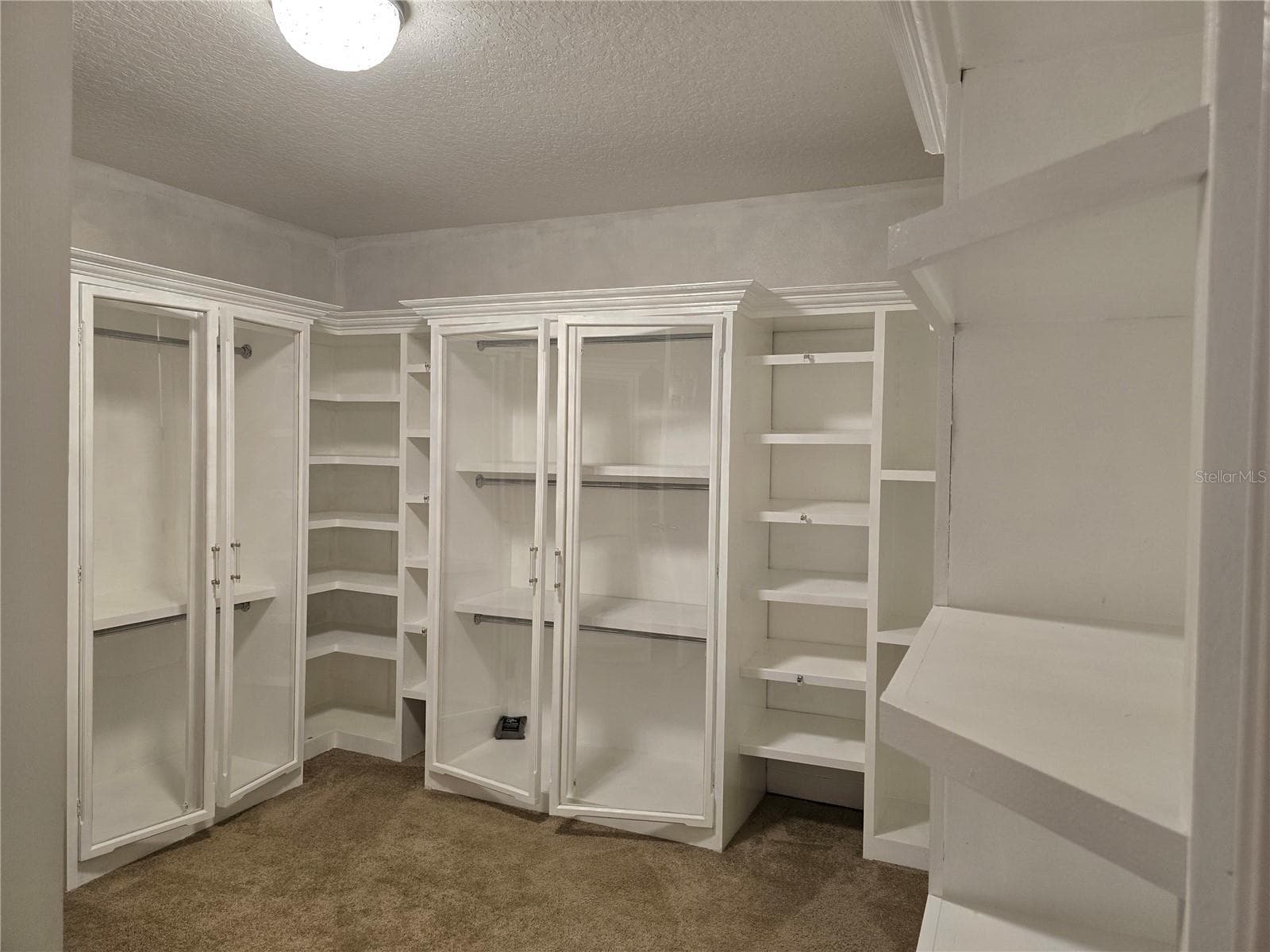 Bedroom 2 converted to a large walk in closet and dressing room. - 3405 HEIRLOOM ROSE PL, OVIEDO