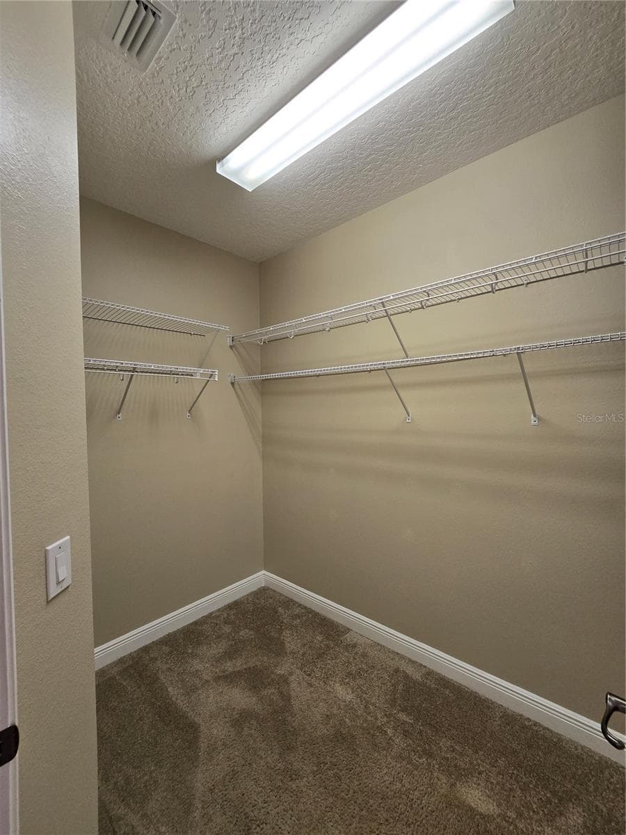Walk in closet #2 in Primary Bedroom - 3405 HEIRLOOM ROSE PL, OVIEDO