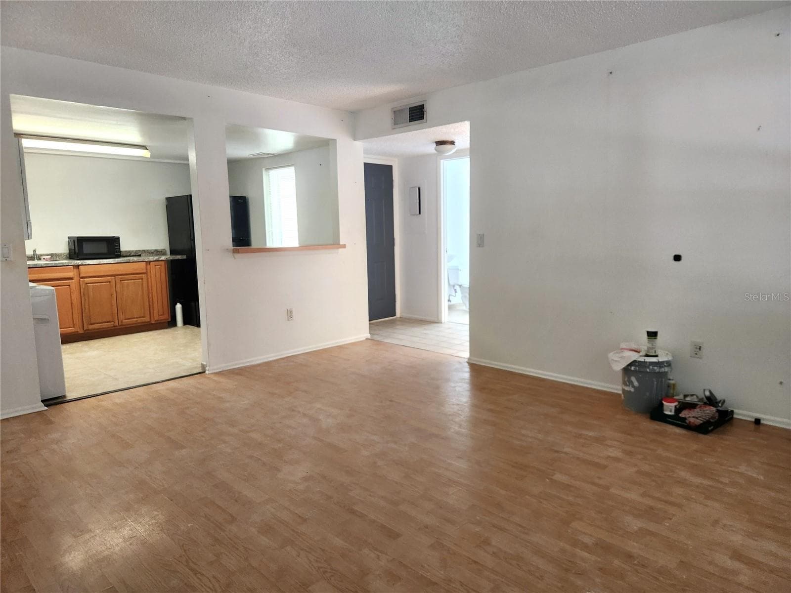 Living Room to Entrance - 8215 FAIRWAYS CIR #G202, OCALA