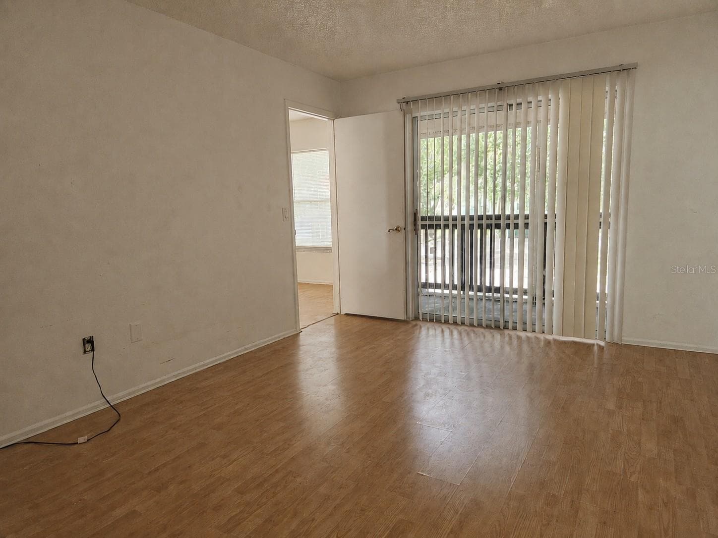 Primary Bedroom to Porch - 8215 FAIRWAYS CIR #G202, OCALA
