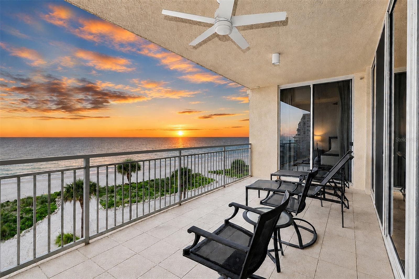 .. Twilights Shots of the Sereno. The Architectural Arc of the Complex Affords the Units with Long Range Gulf Water Views. Residence 404 is Sitting  Right in the Center in the Cat's Seat. . - 15208 GULF BLVD #404, MADEIRA BEACH