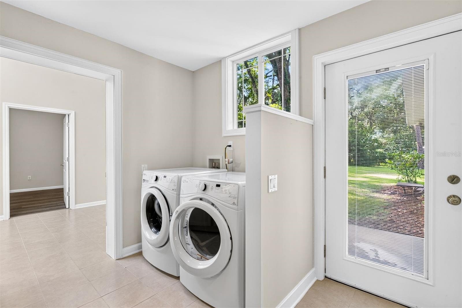 Main House Laundry room & door to back yard - 11101 NW 12TH PL, GAINESVILLE