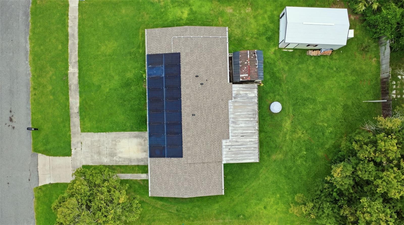 Aerial view of the property. - 1552 ZINNIA DR, DELTONA