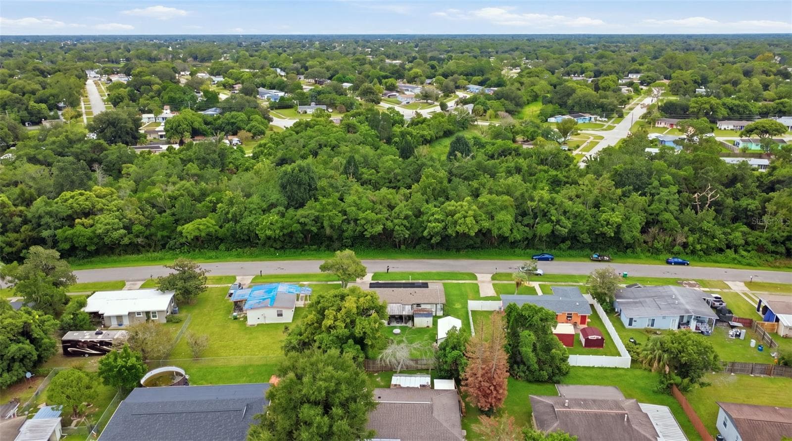 Aerial view of property and street location. - 1552 ZINNIA DR, DELTONA
