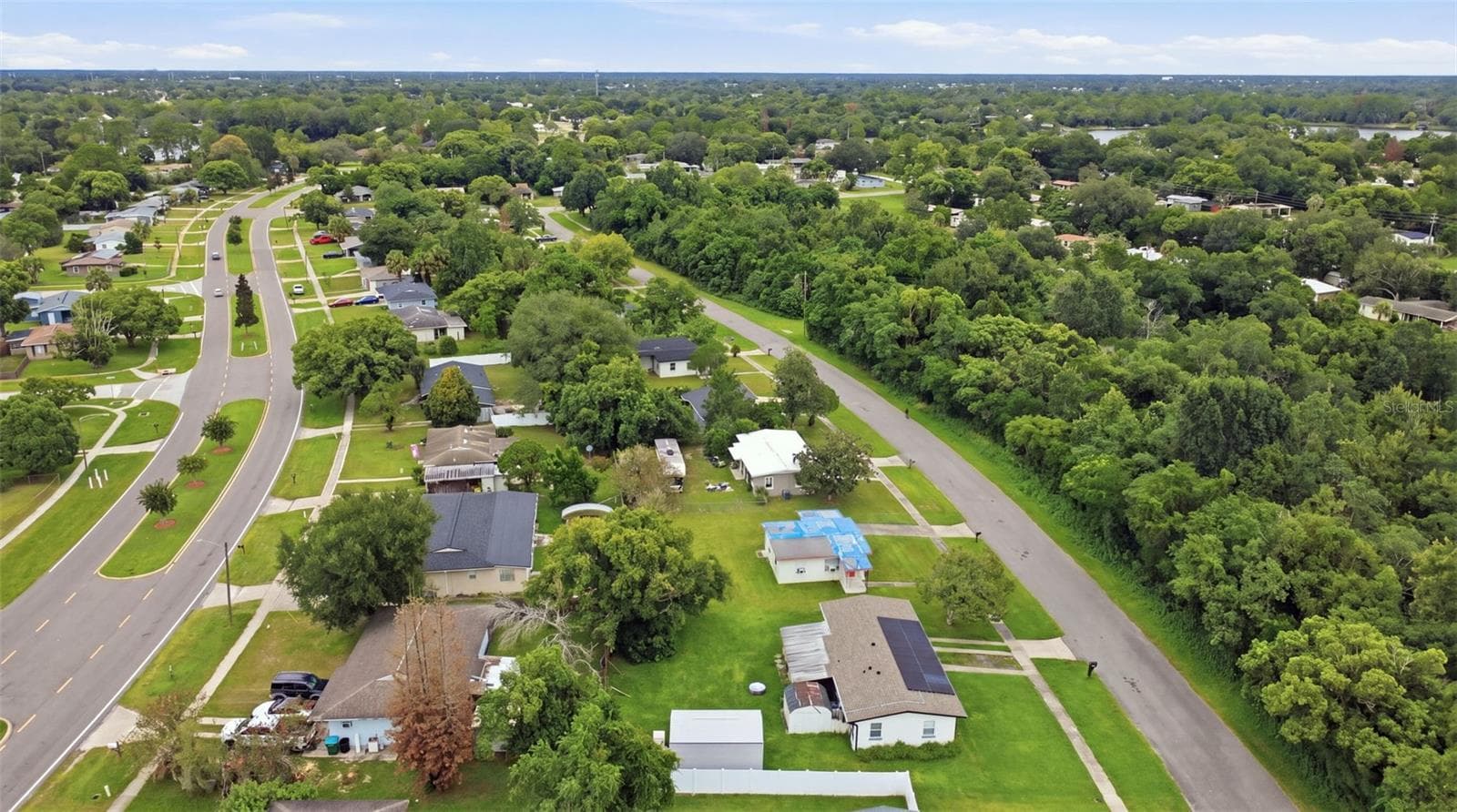Aerial view of neighborhood. - 1552 ZINNIA DR, DELTONA
