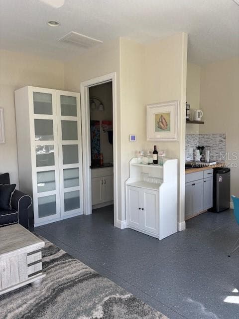 kitchen area and bathvirtually staged - 544 NARROW POND RD, POLK CITY