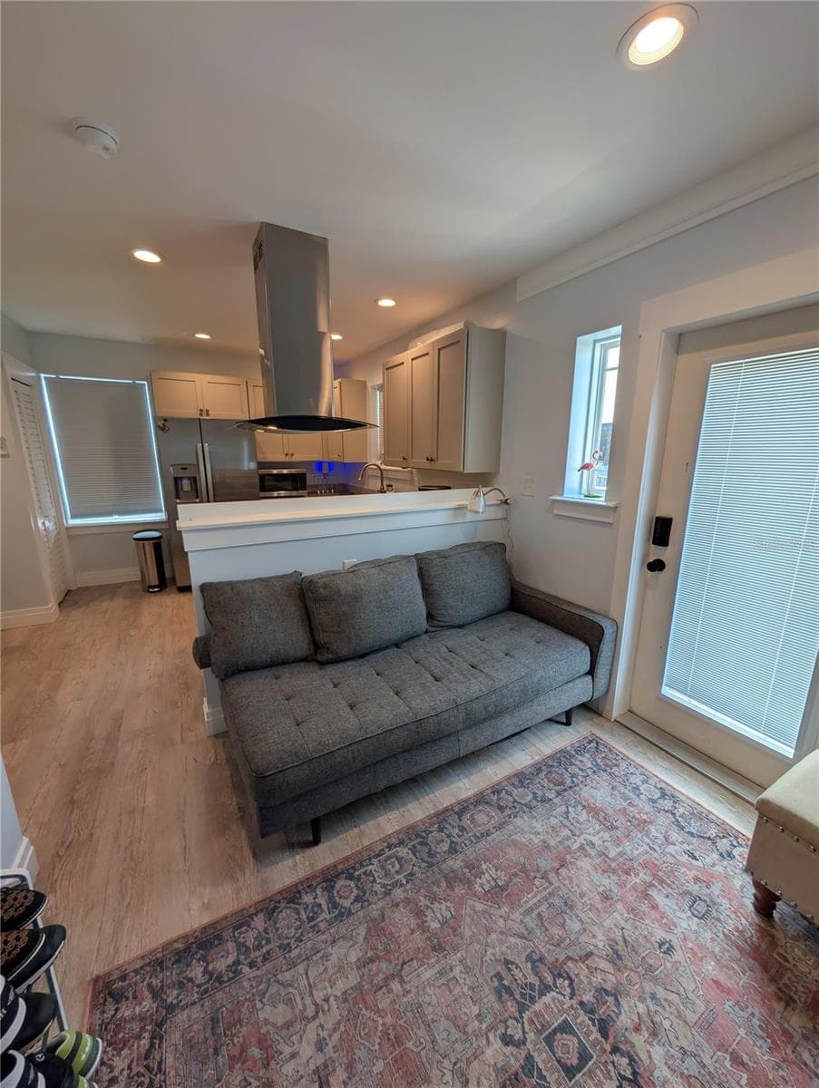 Apartment living room - 414 JESSAMINE BLVD, DAYTONA BEACH