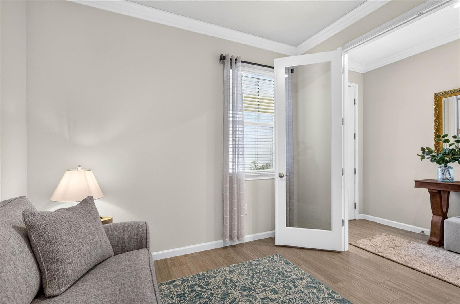 Den with French doors - 864 SNAIL KITE PL, SUN CITY CENTER
