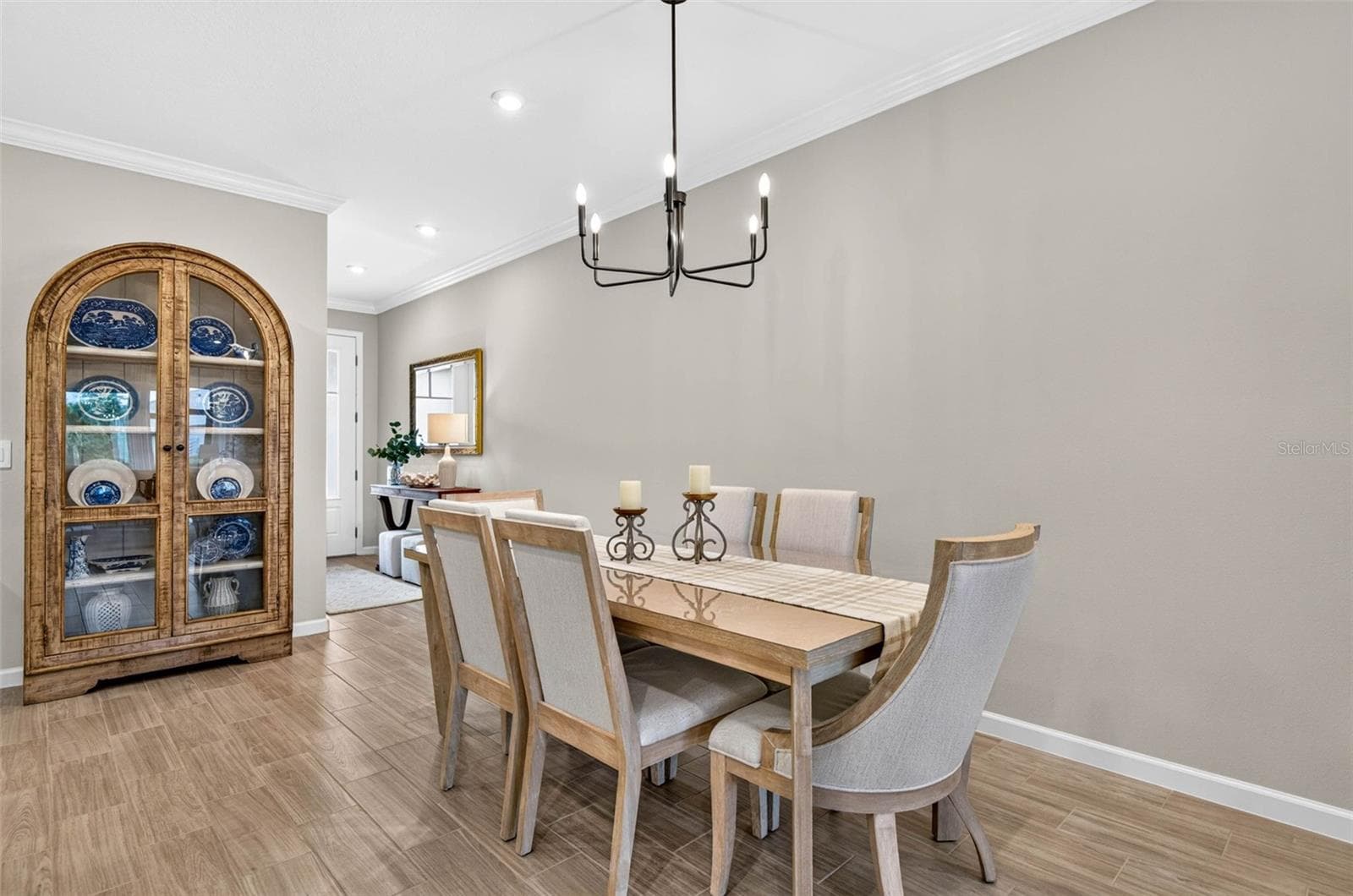 Dining area and room for display cabinet - 864 SNAIL KITE PL, SUN CITY CENTER