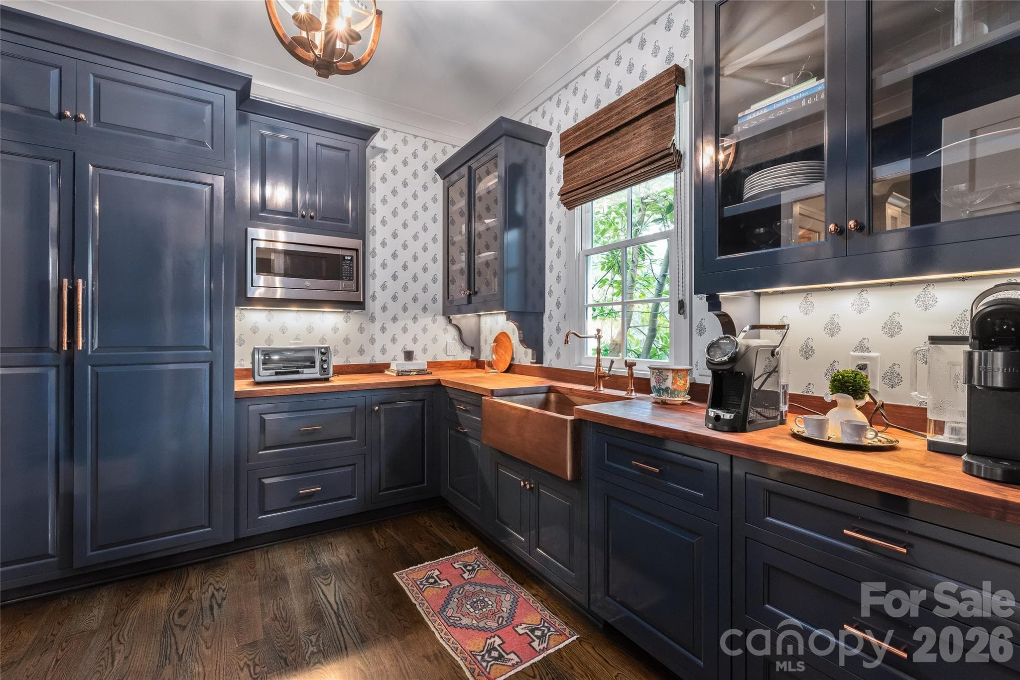 A well appointed Scullery connects the kitchen and formal dining room. Plus it keeps the main space tidy when entertaining. - 2800 Wintergreen Drive, Charlotte