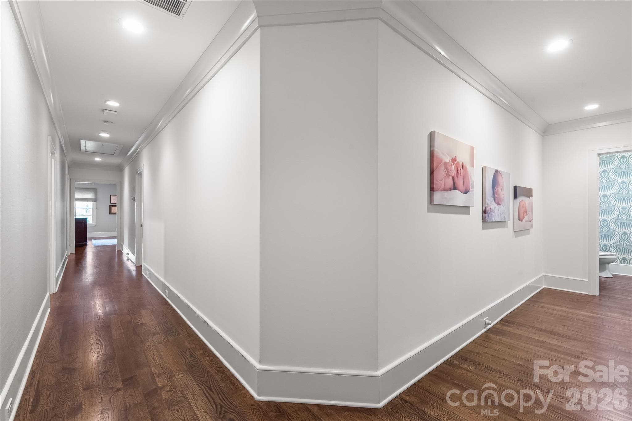 Wood floors carry into the upstair halls. - 2800 Wintergreen Drive, Charlotte