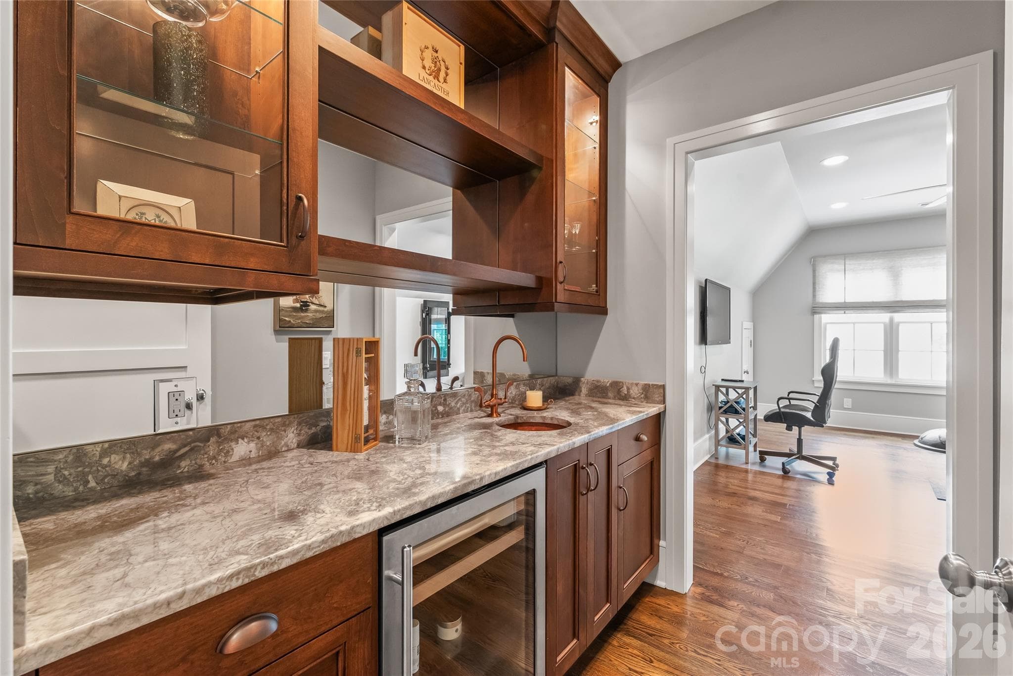 Wet bar area leading into Bonus room. - 2800 Wintergreen Drive, Charlotte