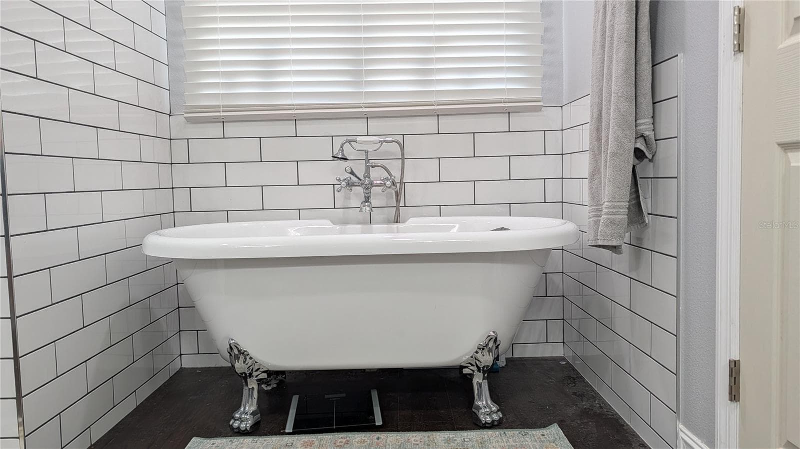 lovely claw foot tub for soaking your cares away. - 345 CANNON ST, LAKELAND