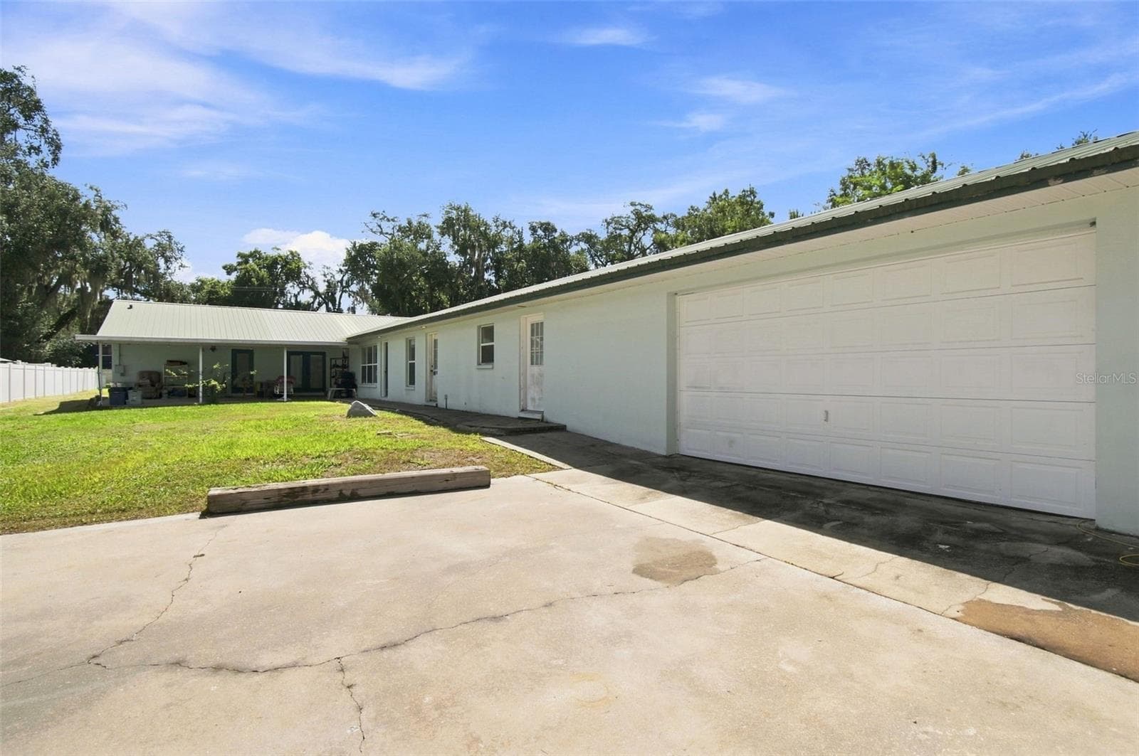 outside of 3 car garage - 2219 NEW JERSEY RD, LAKELAND