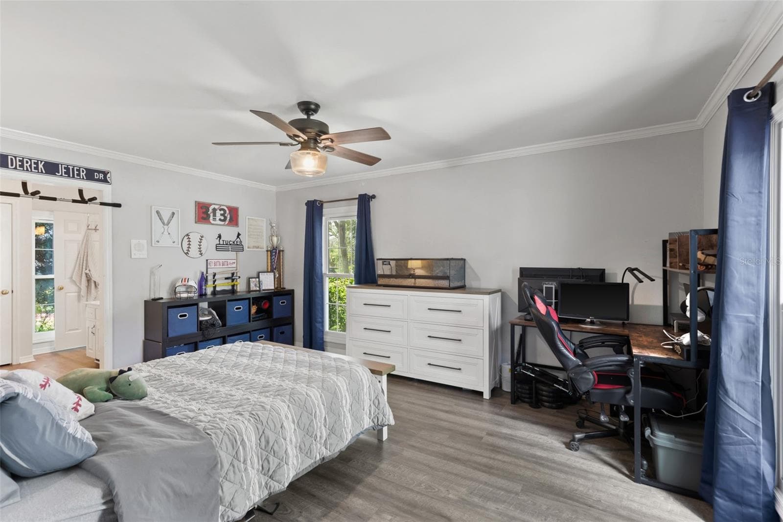 Bedroom 4 is n the first floor behind the hidden door.  It has its own full bathroom. - 4603 DOGWOOD HILLS CT, BRANDON