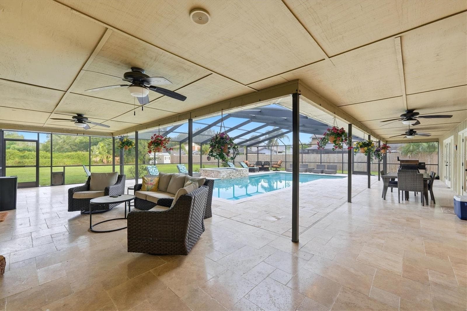 Look at all that space!  Several covered areas are great for relaxing, dining or simply taking a break from the sun! - 15127 PENNINGTON RD, TAMPA