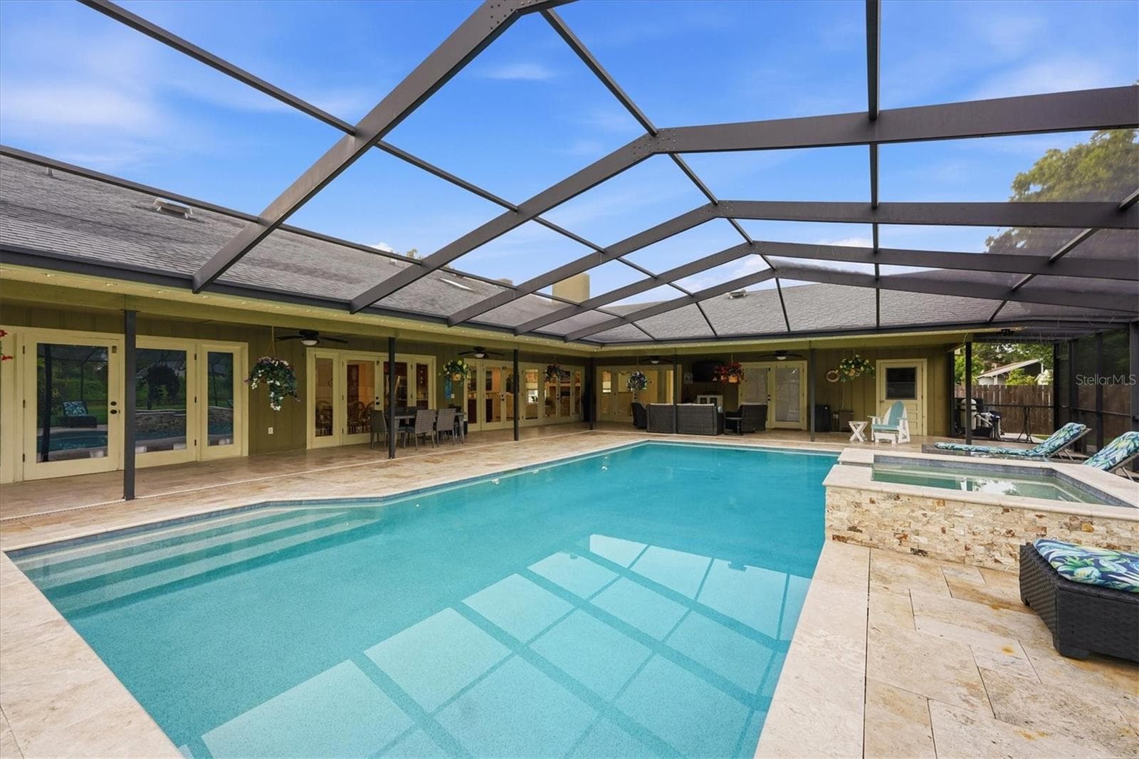 Full view of back of house and covered patio areas. - 15127 PENNINGTON RD, TAMPA