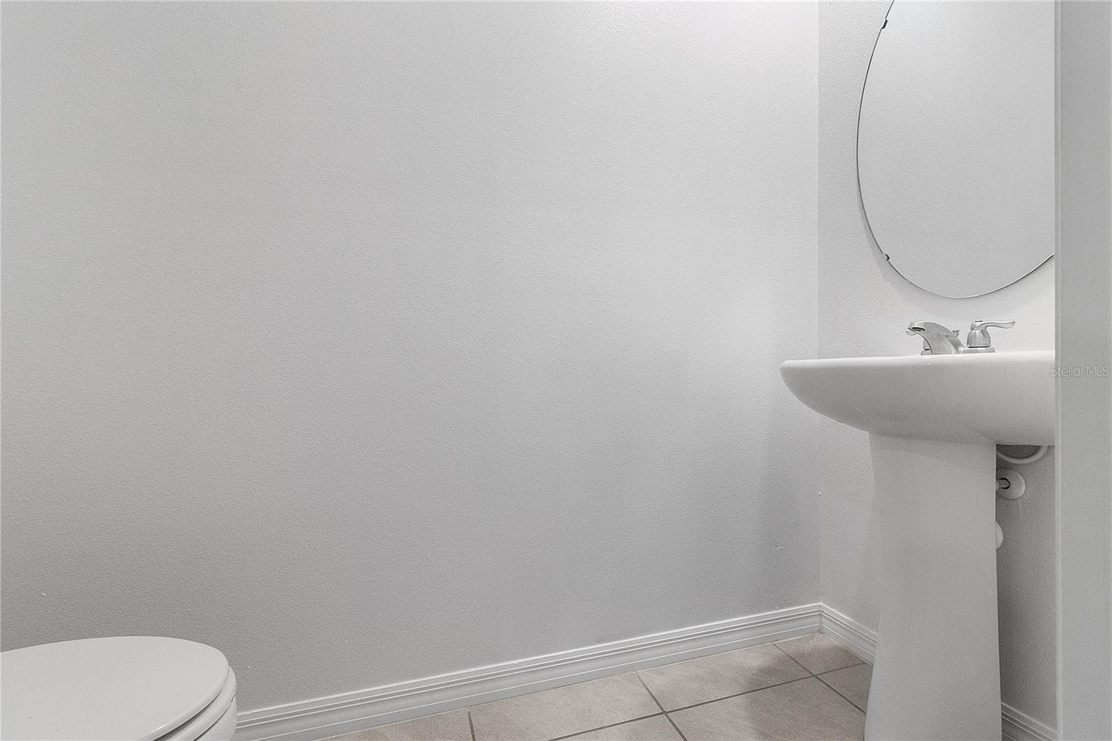 Half bathroom downstairs - 9033 WILDFLOWER LN, KISSIMMEE