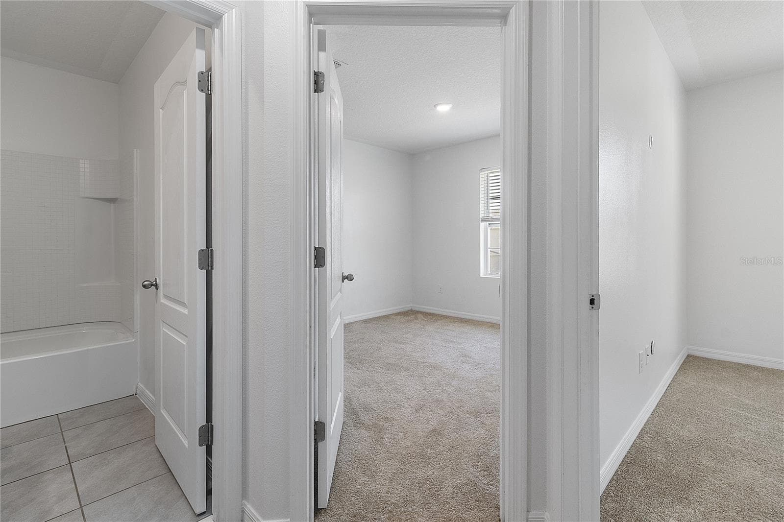 Second bathroom and other bedrooms - 9033 WILDFLOWER LN, KISSIMMEE