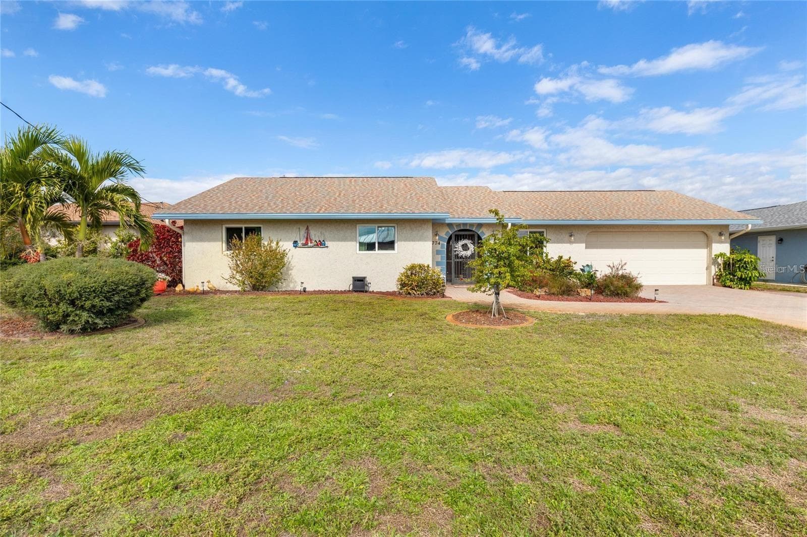 Single Family Residence at 774 SPRING LAKE BLVD NW, PORT CHARLOTTE, photo 2 of 30