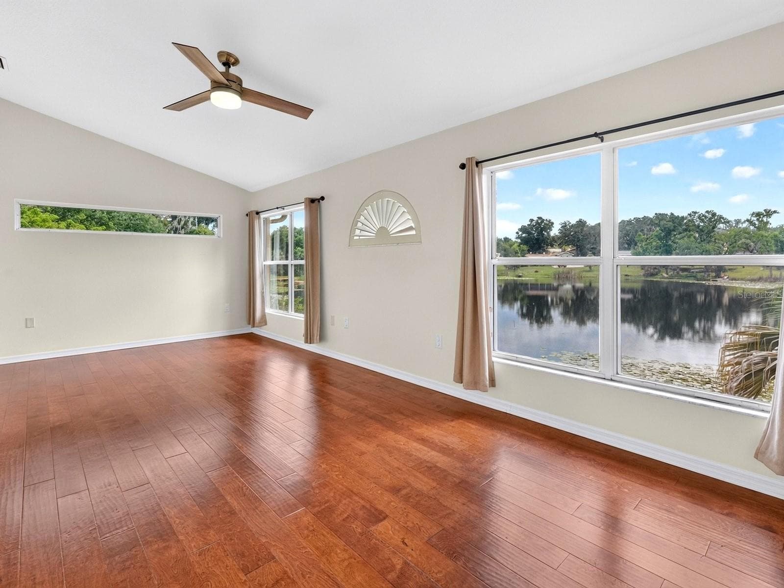 Master bedroom overlooking the lake - 1625 ABRAMS RD, EUSTIS