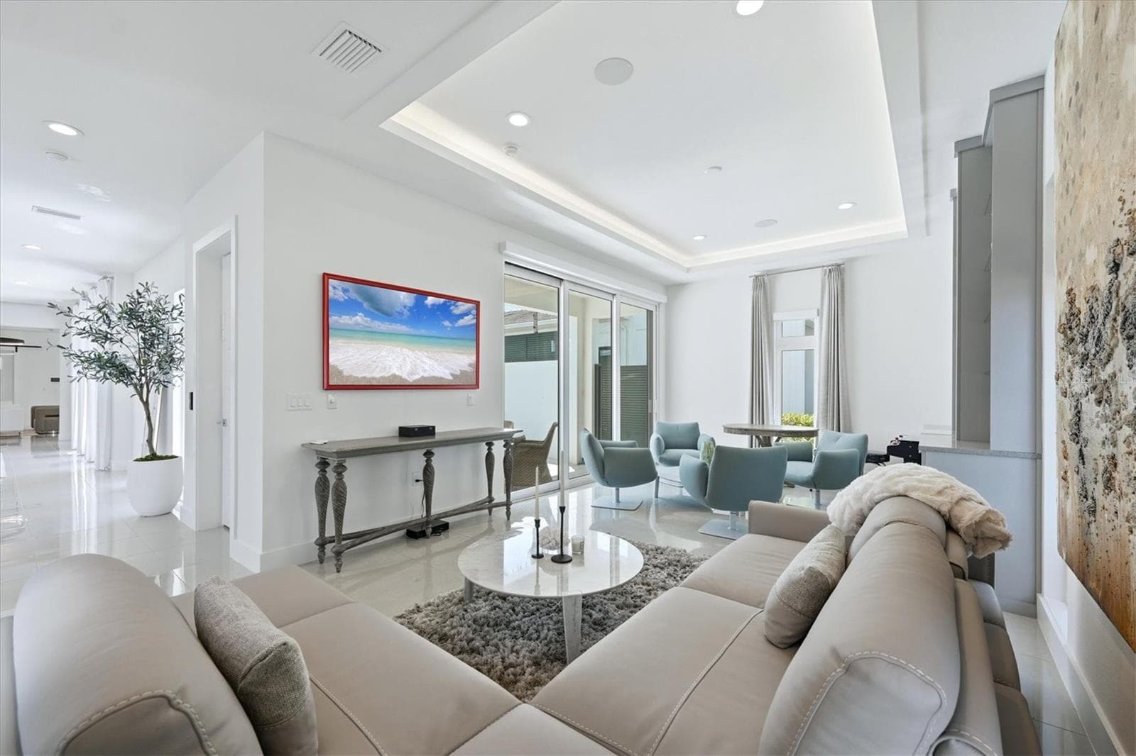 living room, as a bonus room that can be a game room, home gym, or add a door/closet easily for a 4th BEDROOM - 5935 REDBAY BLVD, BRADENTON