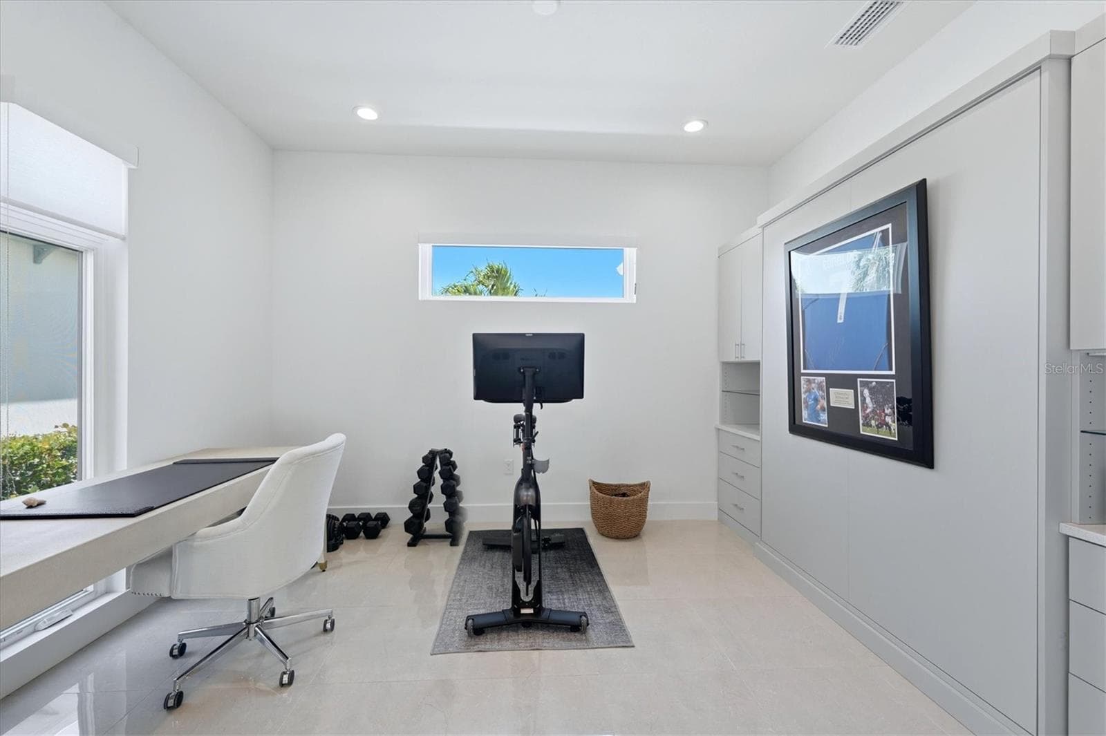 home office with barn doors and Murphy bed/cabinets for impromptu guests - 5935 REDBAY BLVD, BRADENTON
