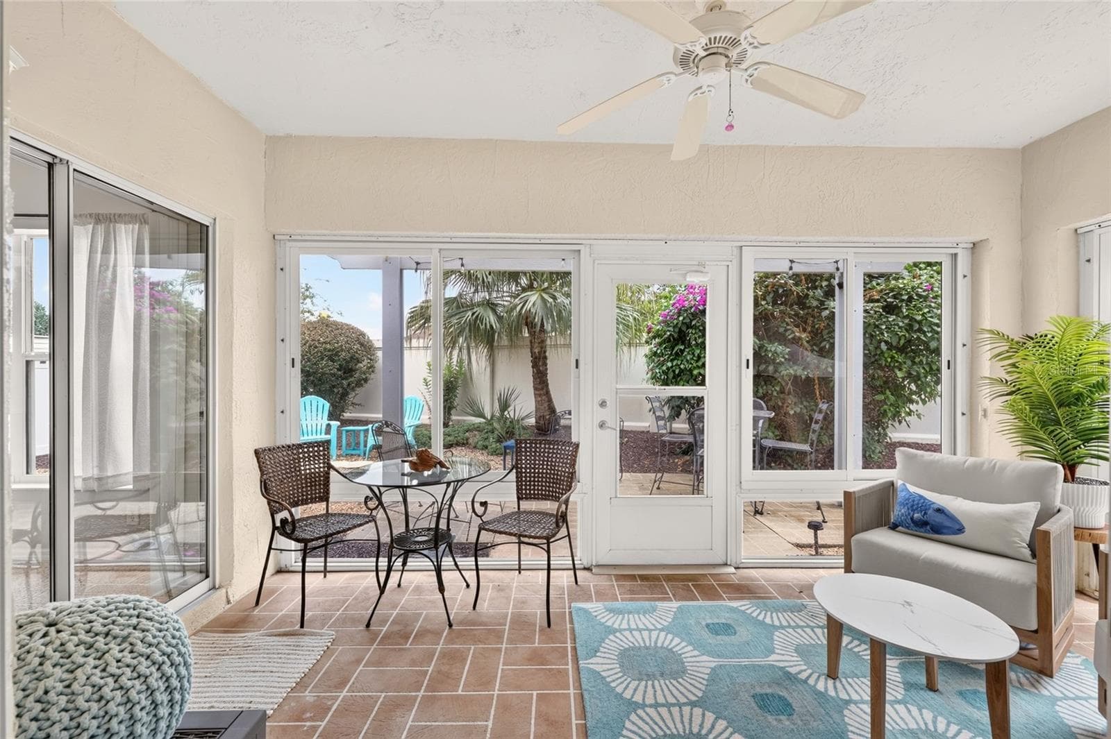 Enclosed lanai with 2 sets of sliding patio doors leading back into the house! - 17198 SE 84TH KNIGHT AVE, THE VILLAGES