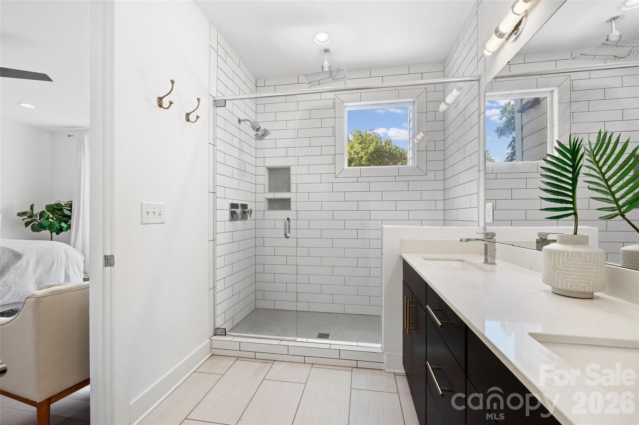 Spa-like primary bath with dual shower heads - 1633 Duckworth Avenue, Charlotte