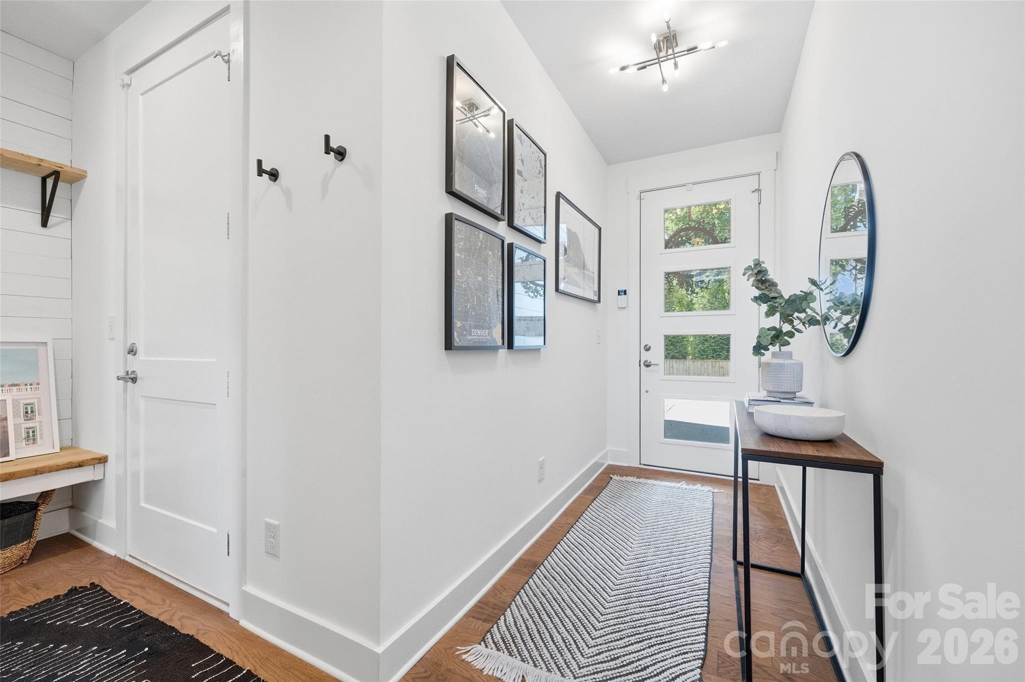 Entry with garage access, coat closet + built-in drop zone - 1633 Duckworth Avenue, Charlotte