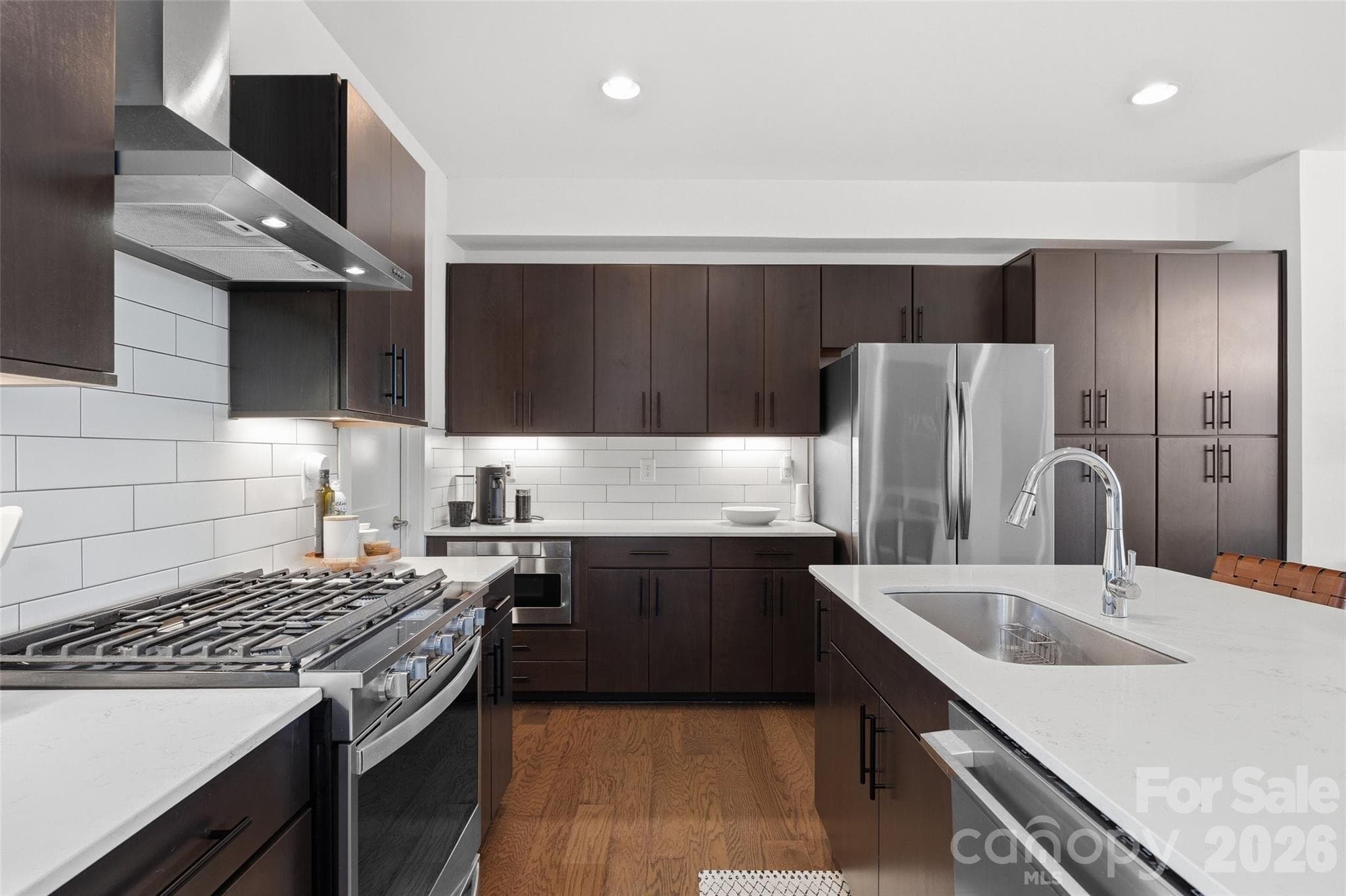 Gas range with hood and stainless steel appliances - 1633 Duckworth Avenue, Charlotte