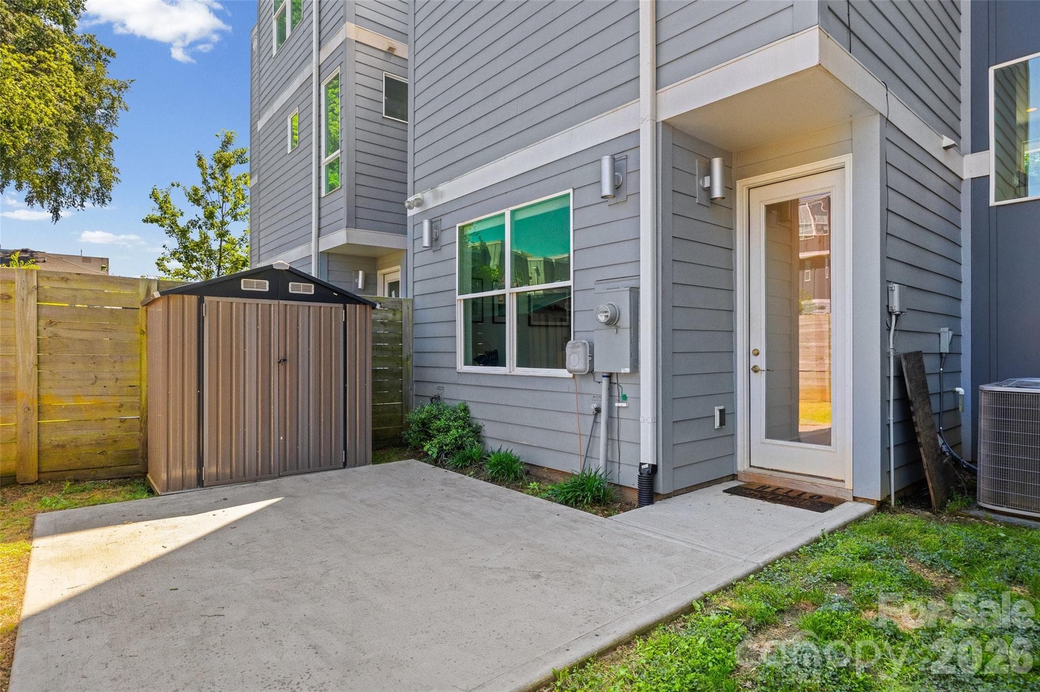 Private fenced backyard + patio (unstaged) - 1633 Duckworth Avenue, Charlotte