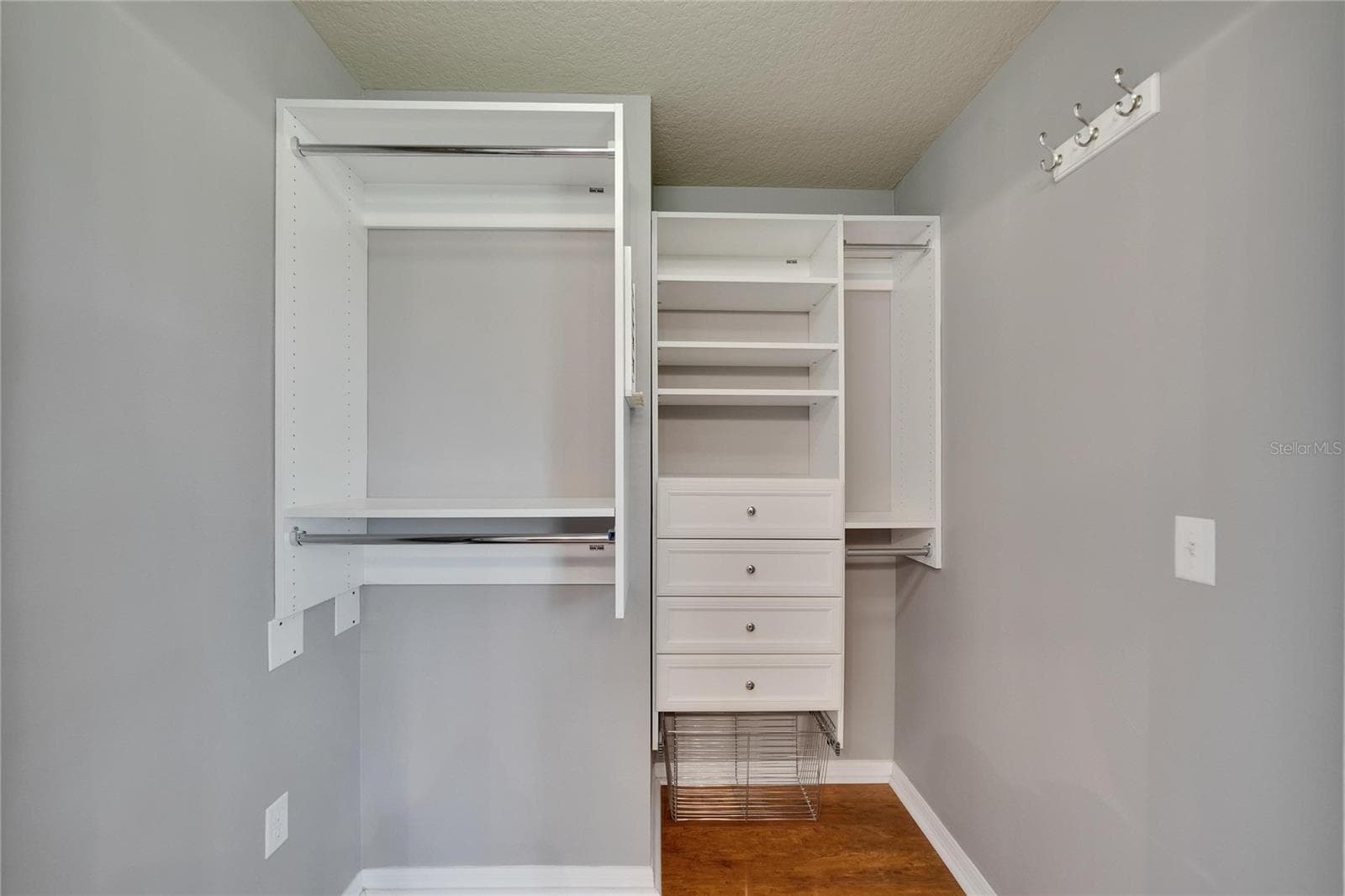 Primary bedroom walk-in closet with built-ins - 7001 INTERBAY BLVD ## 112, TAMPA