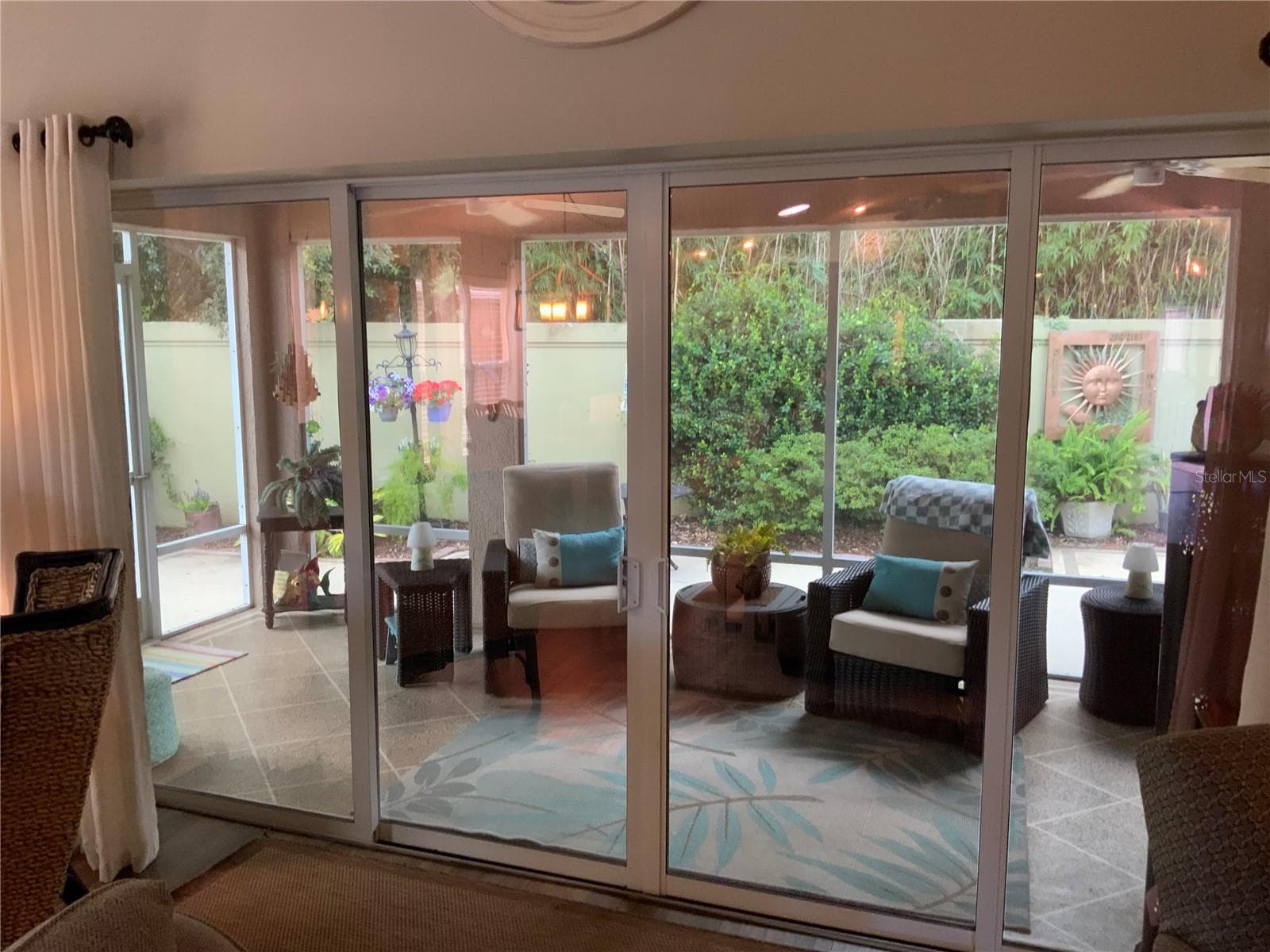 Looking out to the  lanai area and backyard. - 2334 ROSE ARBOR ST, THE VILLAGES