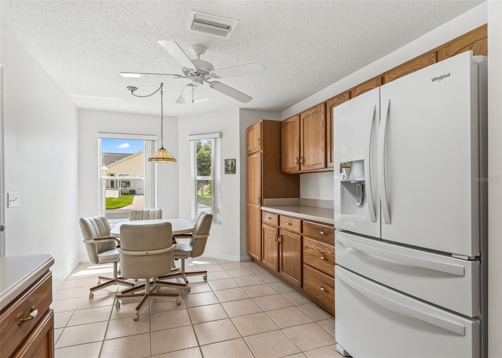 Kitchen showing breakfast nook - 1506 AQUINO LN, THE VILLAGES