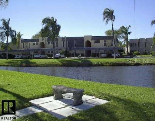 View of pond in front of Elmwood Circle - 112 ELMWOOD CIR #112, SEMINOLE