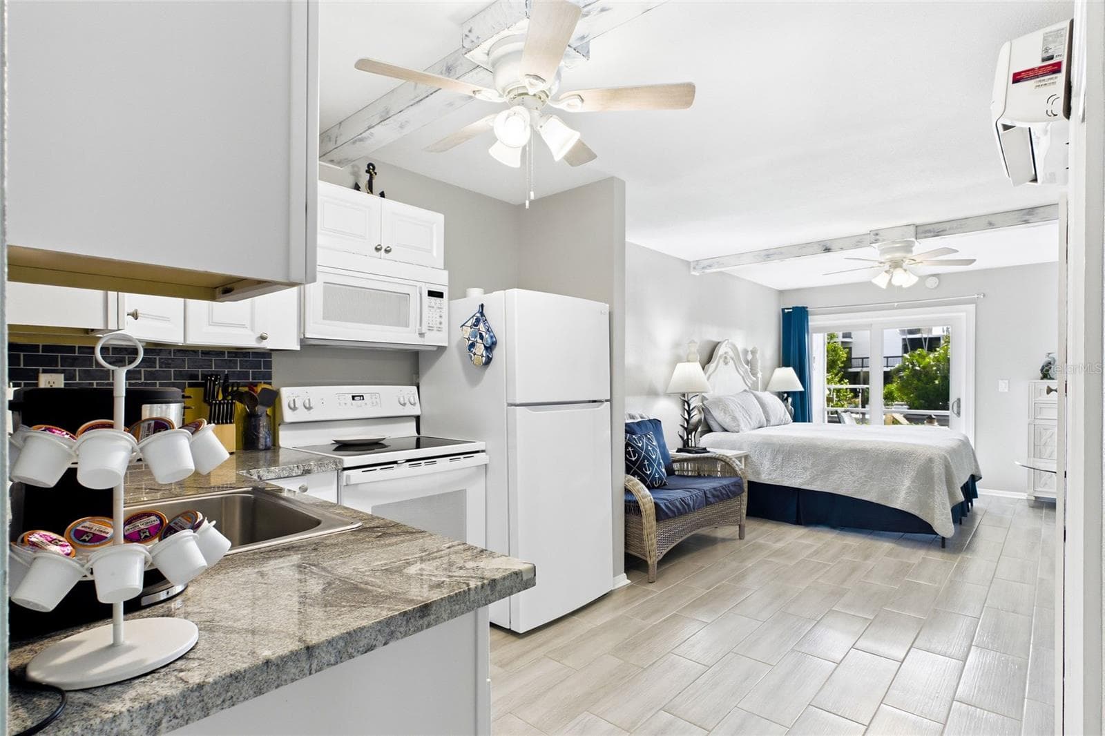 THE CRANE ROOM Each thoughtfully designed studio features an open bedroom and living area, creating a comfortable and functional space with a fresh coastal feel. - 3226 STRINGFELLOW RD, ST JAMES CITY