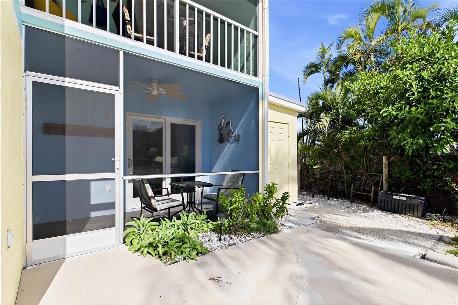 Private balcony offering a relaxing outdoor retreat to enjoy morning coffee, fresh island breezes, and beautiful Florida sunsets. - 3226 STRINGFELLOW RD, ST JAMES CITY