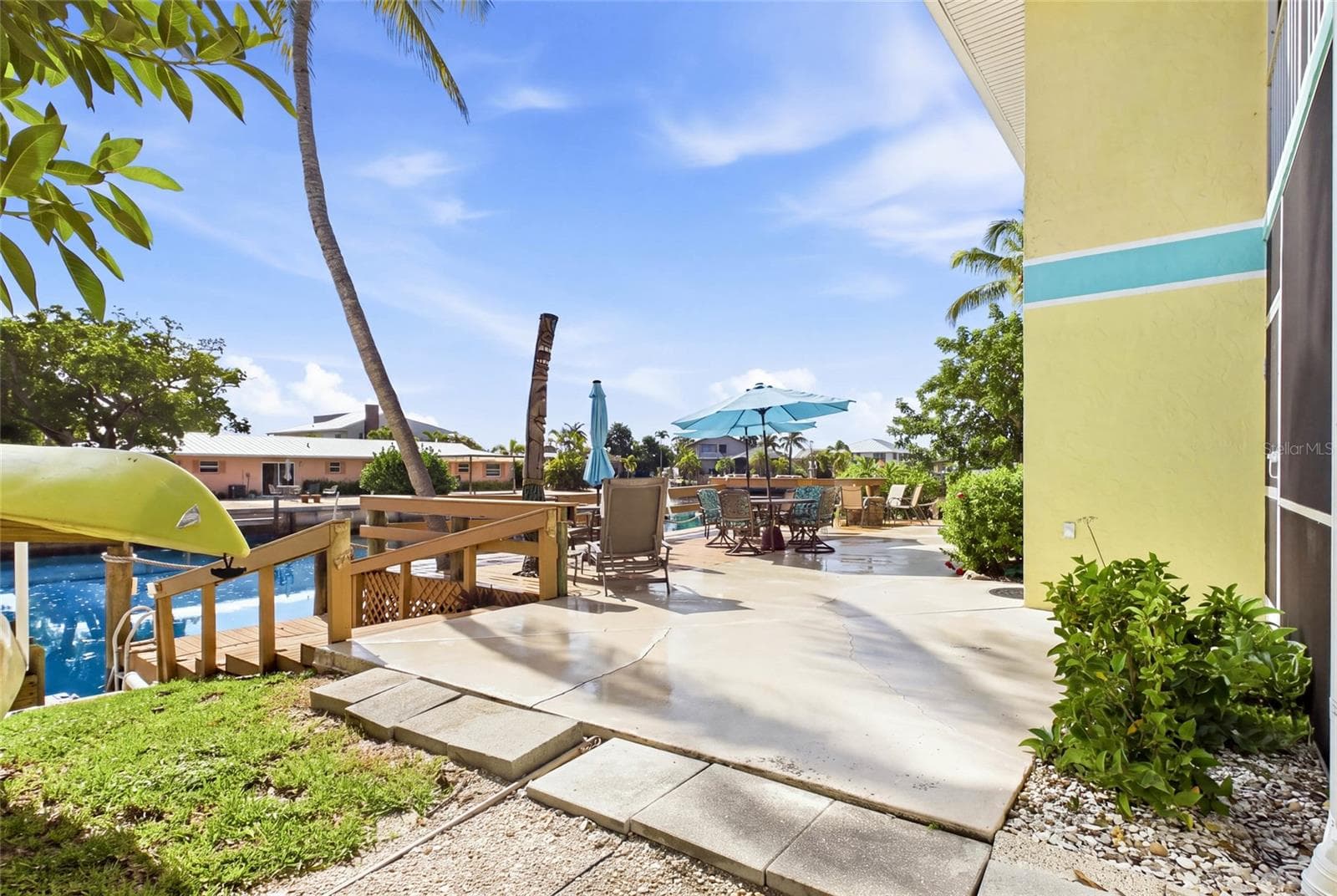 The oversized property provides generous outdoor areas where residents and vacation guests can relax and enjoy the casual Pine Island lifestyle. - 3226 STRINGFELLOW RD, ST JAMES CITY