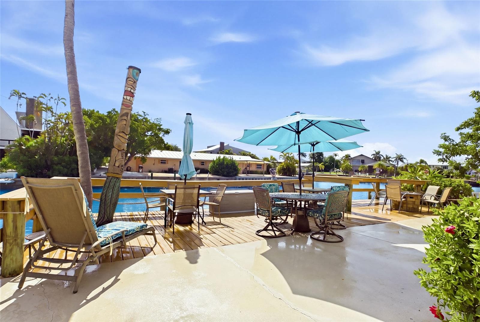 Imagine your guests ending the day waterfront, sharing fishing stories and watching the Florida sunset from the expansive canal-side deck. - 3226 STRINGFELLOW RD, ST JAMES CITY