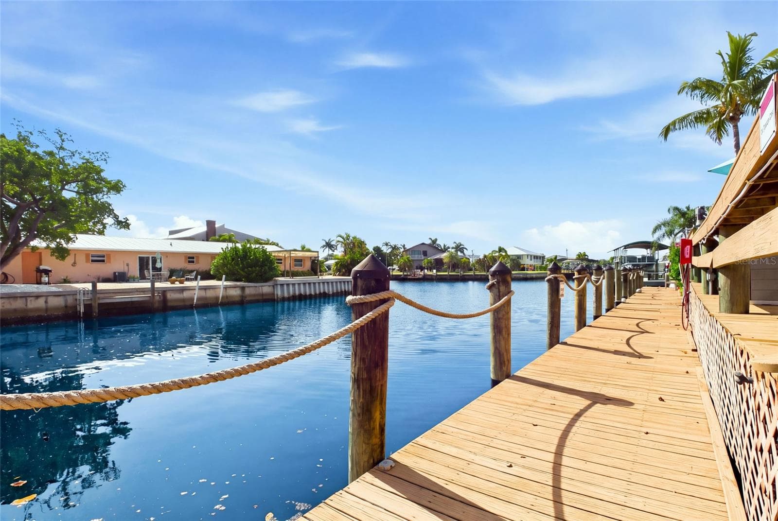 Beautiful canal views and tropical surroundings capture the relaxed island atmosphere that makes such a desirable vacation destination. - 3226 STRINGFELLOW RD, ST JAMES CITY